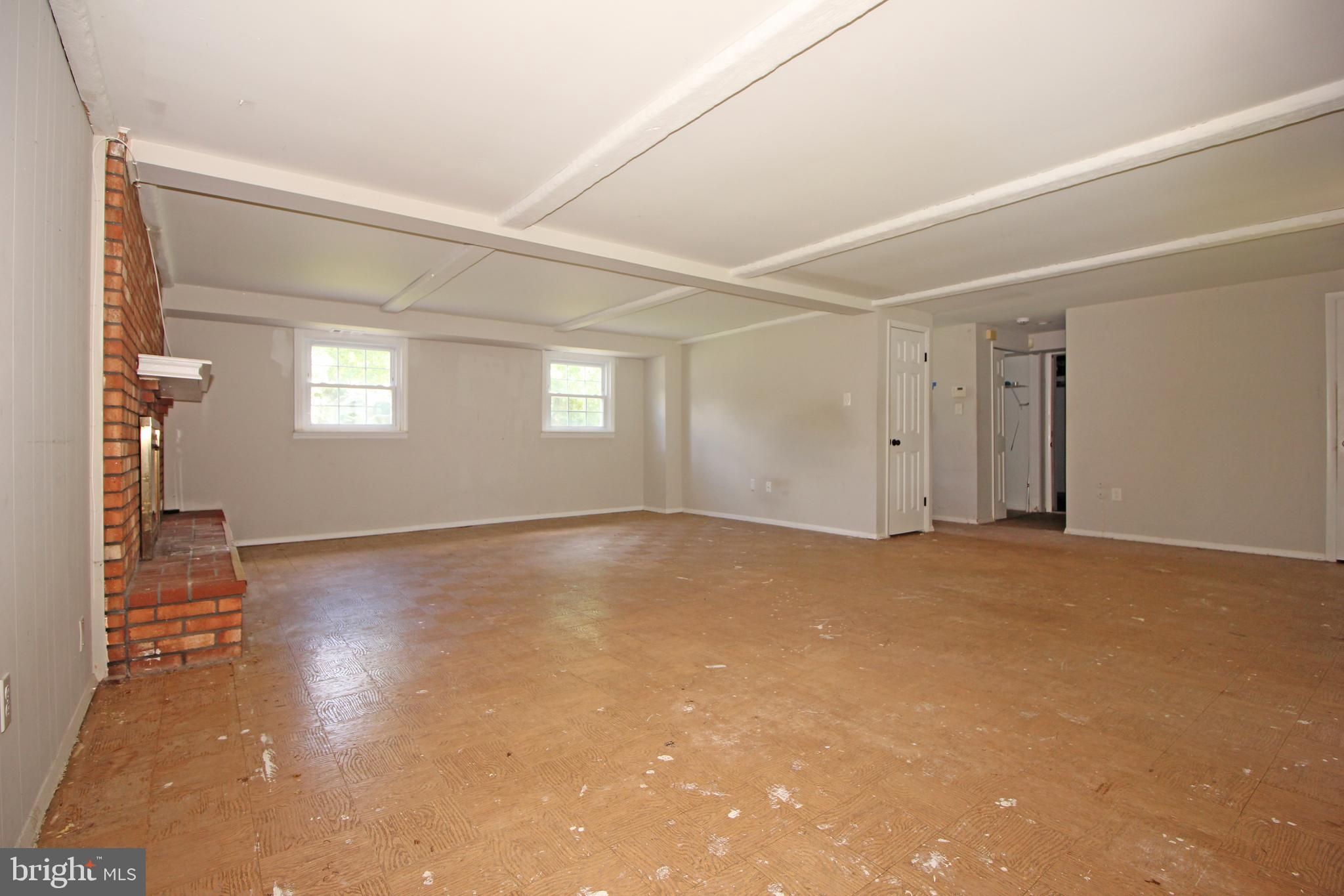 2 Twig Lane Willingboro, NJ 08046 - Photo 21 of 32 an empty room with wooden floor and windows