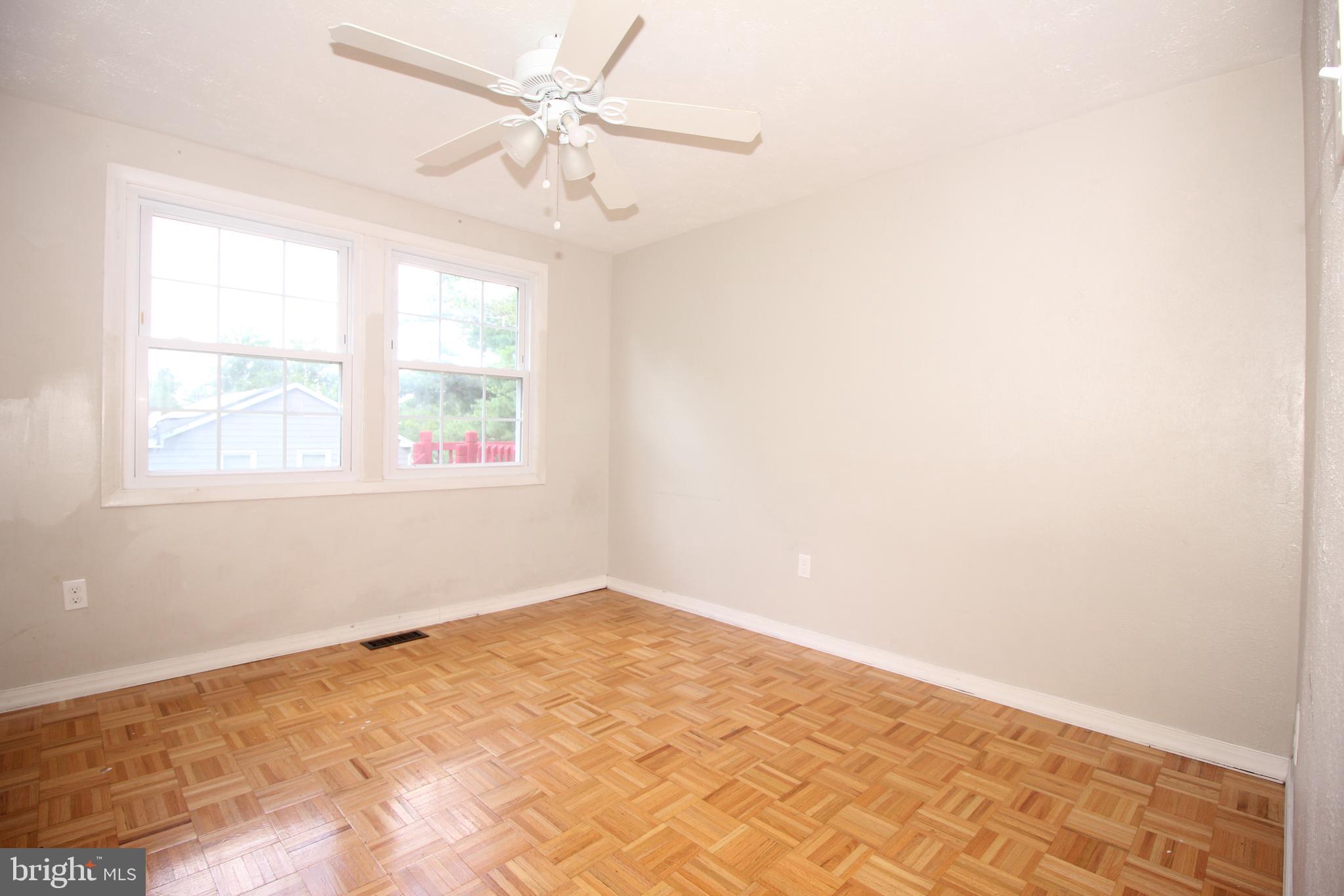 2 Twig Lane Willingboro, NJ 08046 - Photo 10 of 32 an empty room with a window and a fan
