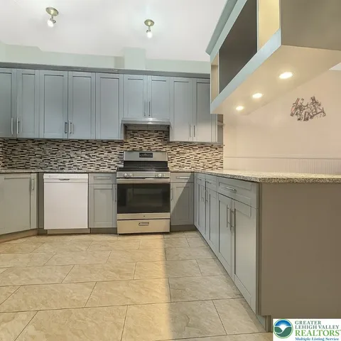 a view of cabinets with wooden floor