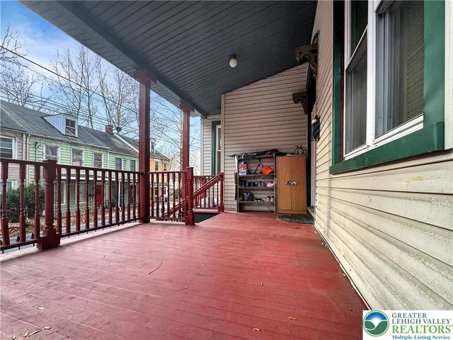 a view of an entryway with a front door