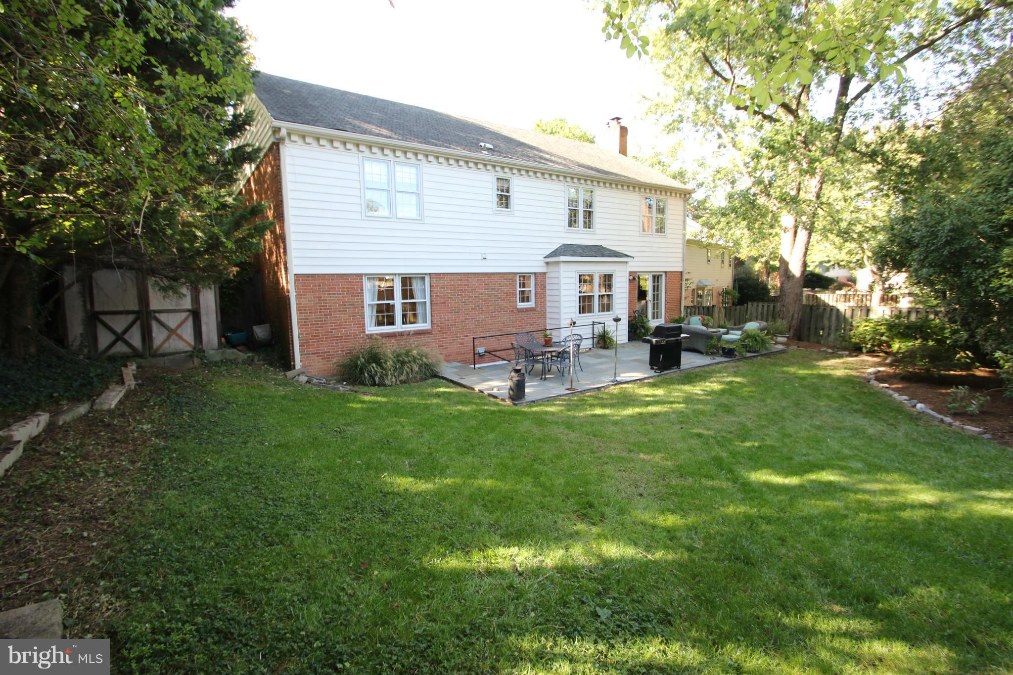 1605 Stonebridge Road Alexandria, VA 22304 - Photo 30 of 30 Flagstone patio and large fenced yard