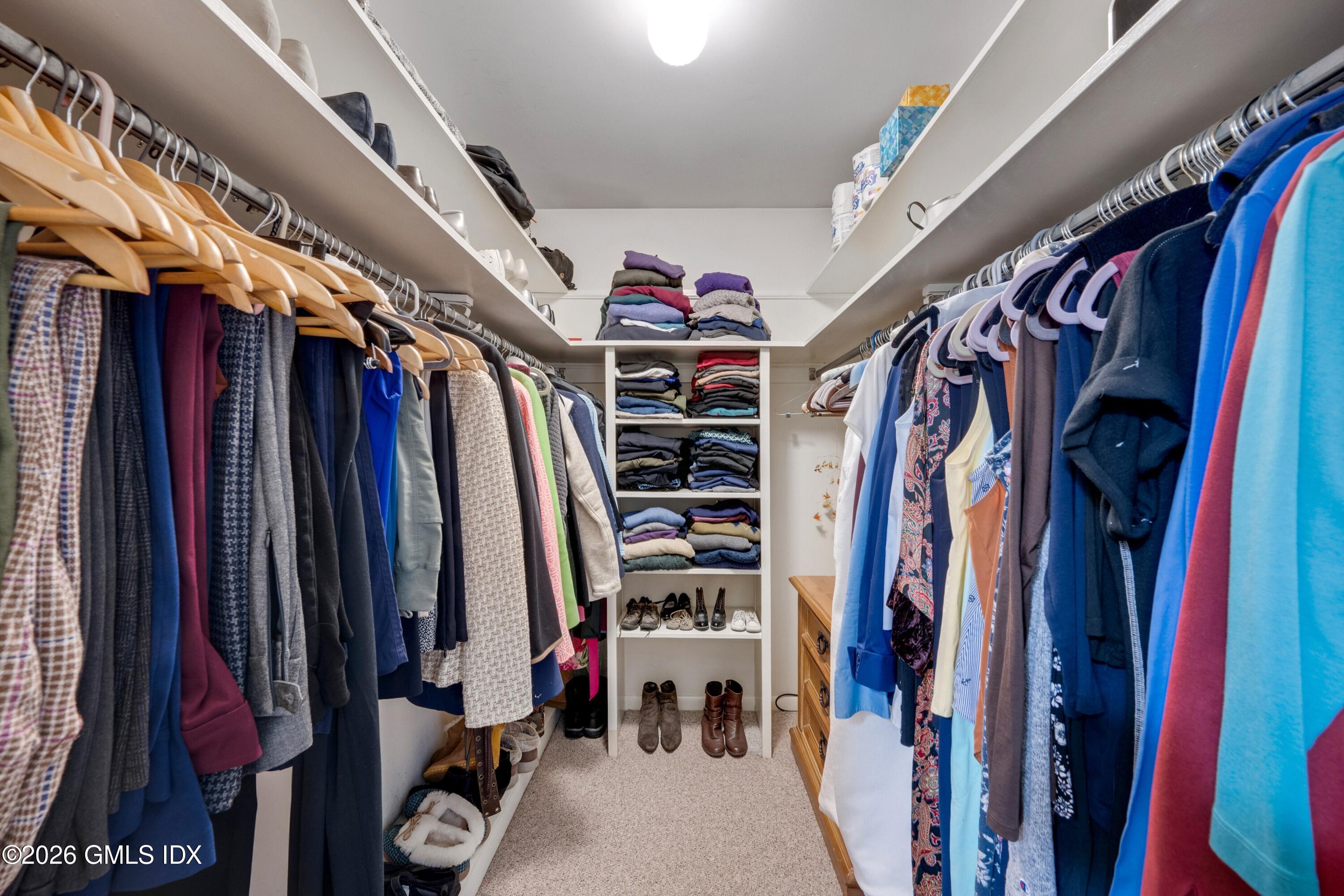 58 Stirrup Lane, Unit 58 Riverside, CT 06878 - Photo 10 of 23 a view of walk in closet with clothes