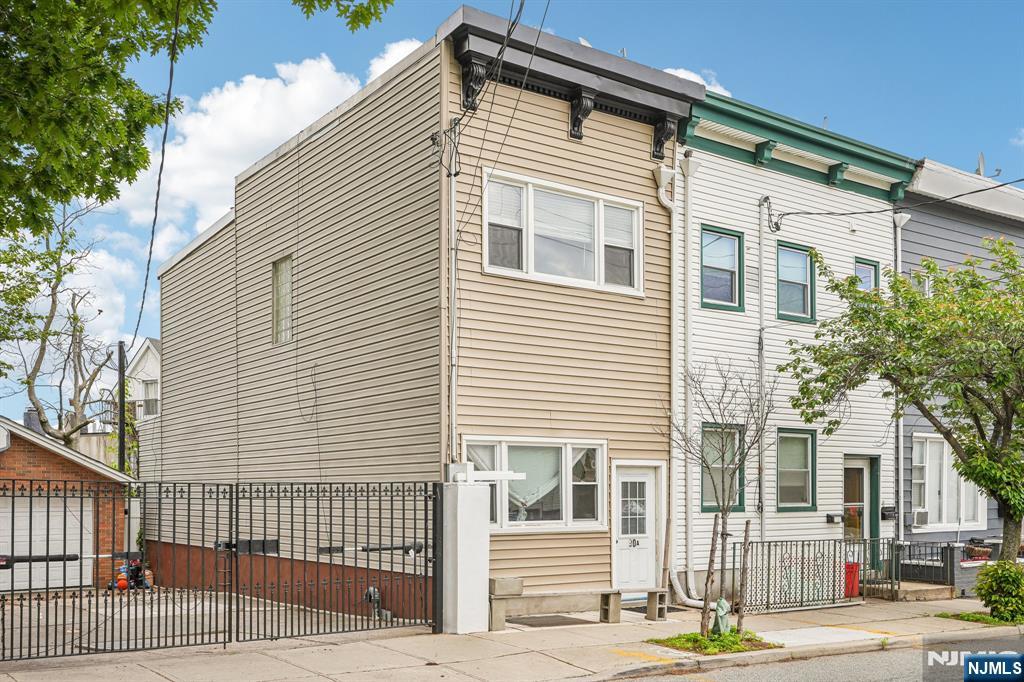 90 A Hackensack Plank Road Weehawken, NJ 07086 - Photo 4 of 40 a view of a house with a small garden