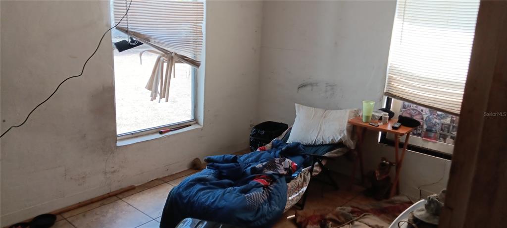 555 Lee Road Jacksonville, FL 32225 - Photo 13 of 67 a living room with furniture and a window