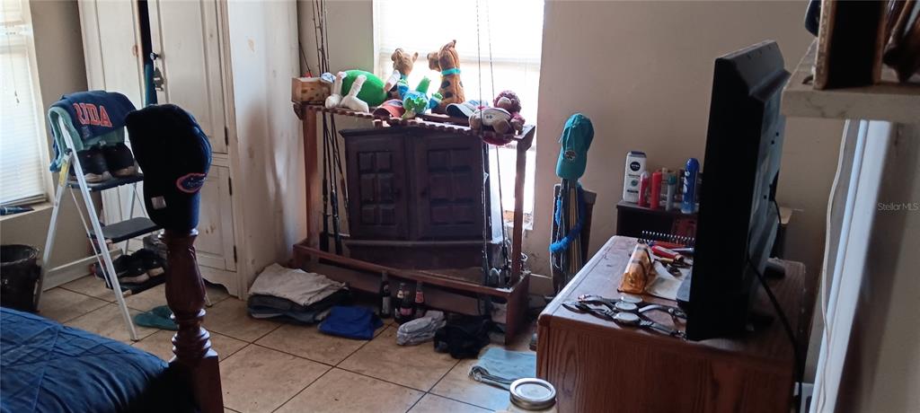 555 Lee Road Jacksonville, FL 32225 - Photo 17 of 67 a room with storage and utility