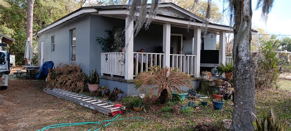 555 Lee Road Jacksonville, FL 32225 - Photo 2 of 67 front view of a house with a small yard