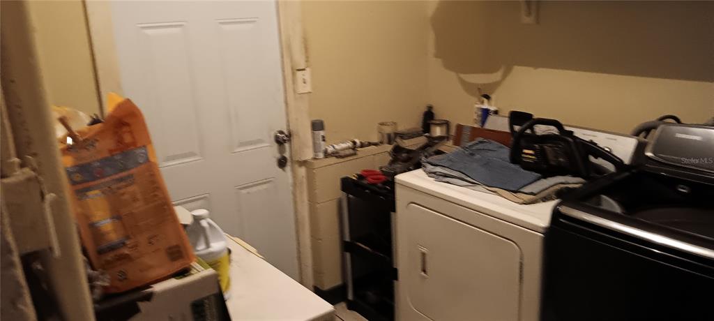 555 Lee Road Jacksonville, FL 32225 - Photo 27 of 67 a utility room with dryer and washer