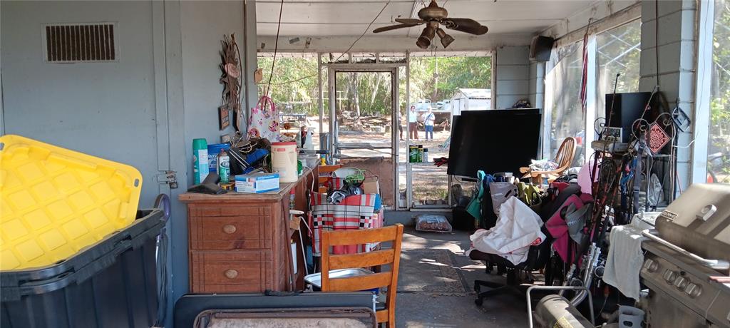 555 Lee Road Jacksonville, FL 32225 - Photo 39 of 67 a room with furniture and a flat screen tv