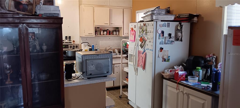 555 Lee Road Jacksonville, FL 32225 - Photo 46 of 67 a room with storage and utility