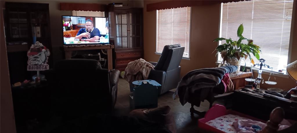 555 Lee Road Jacksonville, FL 32225 - Photo 51 of 67 view of a livingroom with furniture and a potted plant