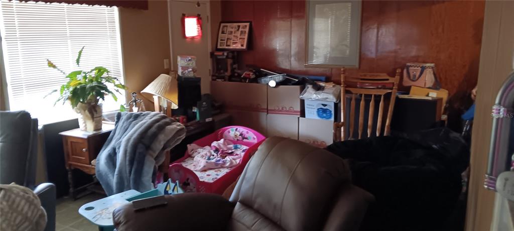 555 Lee Road Jacksonville, FL 32225 - Photo 52 of 67 a view of entryway and livingroom with furniture