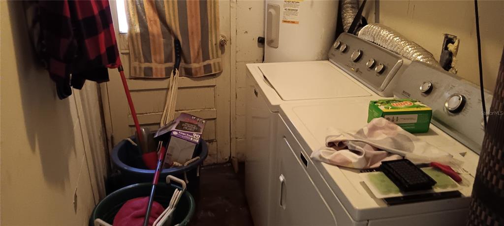 555 Lee Road Jacksonville, FL 32225 - Photo 53 of 67 a utility room with dryer washer and other items