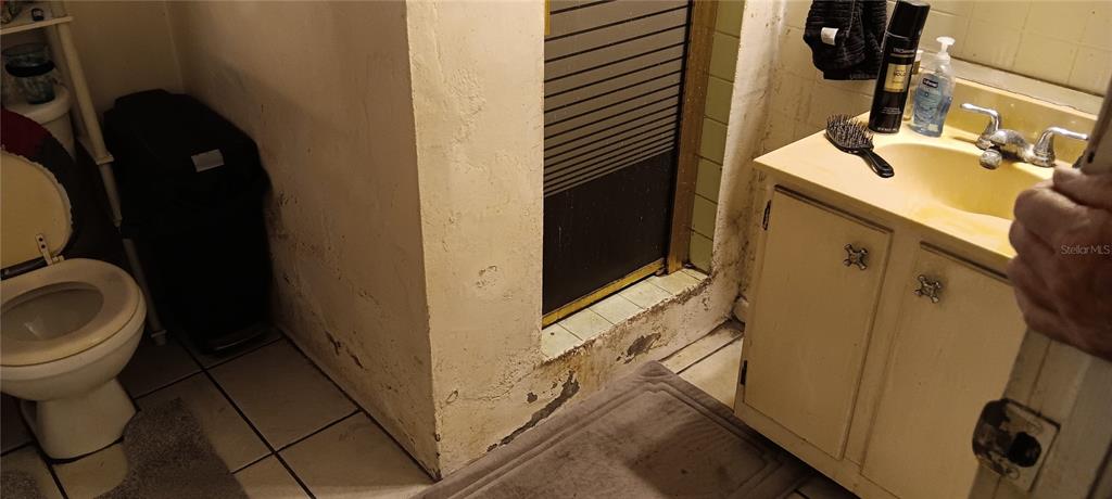 555 Lee Road Jacksonville, FL 32225 - Photo 55 of 67 a bathroom with a sink and toilet