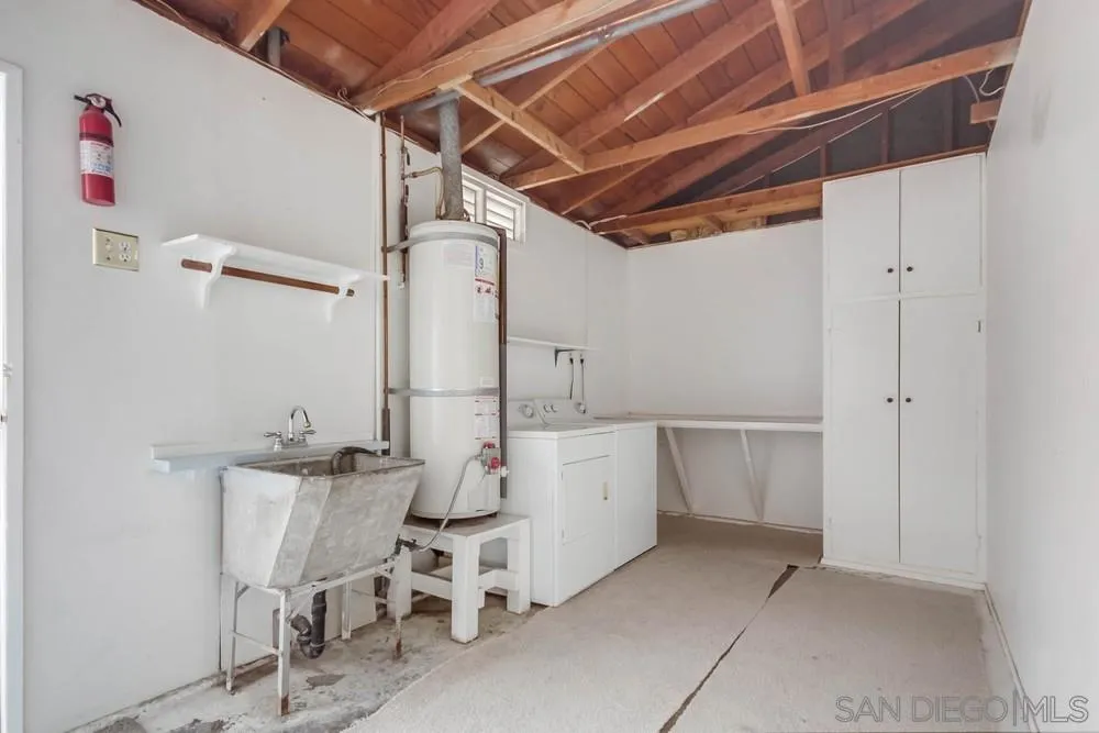 9464 Stoyer Drive Santee, CA 92071 - Photo 21 of 25 a view of a storage & utility room with multiple racks