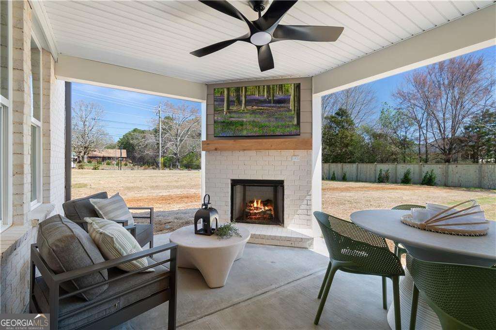 420 Hartsfield Road McDonough, GA 30253 - Photo 13 of 44 a view of a dining room with furniture window and outside view
