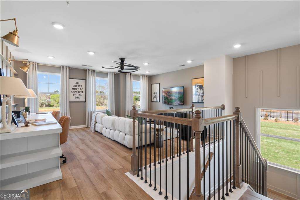 420 Hartsfield Road McDonough, GA 30253 - Photo 28 of 44 a bedroom with furniture and a large window