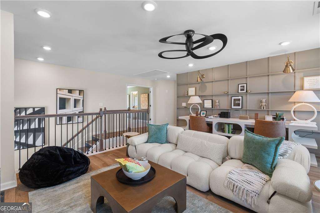 420 Hartsfield Road McDonough, GA 30253 - Photo 30 of 44 a living room with furniture kitchen and a window