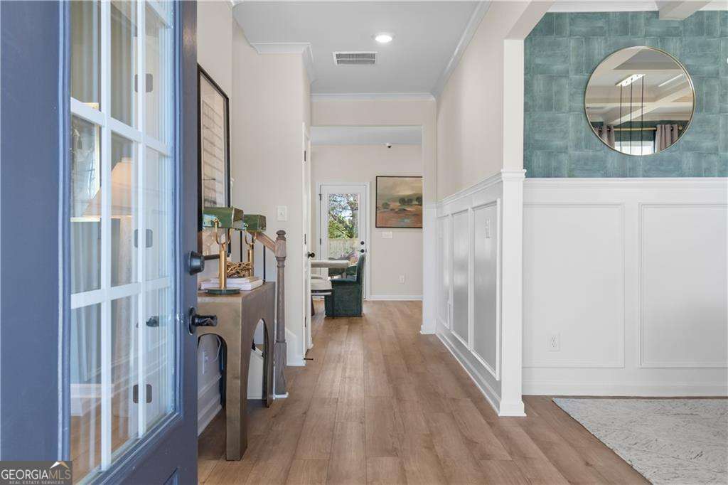 420 Hartsfield Road McDonough, GA 30253 - Photo 4 of 44 a view of a livingroom with furniture and hardwood floor