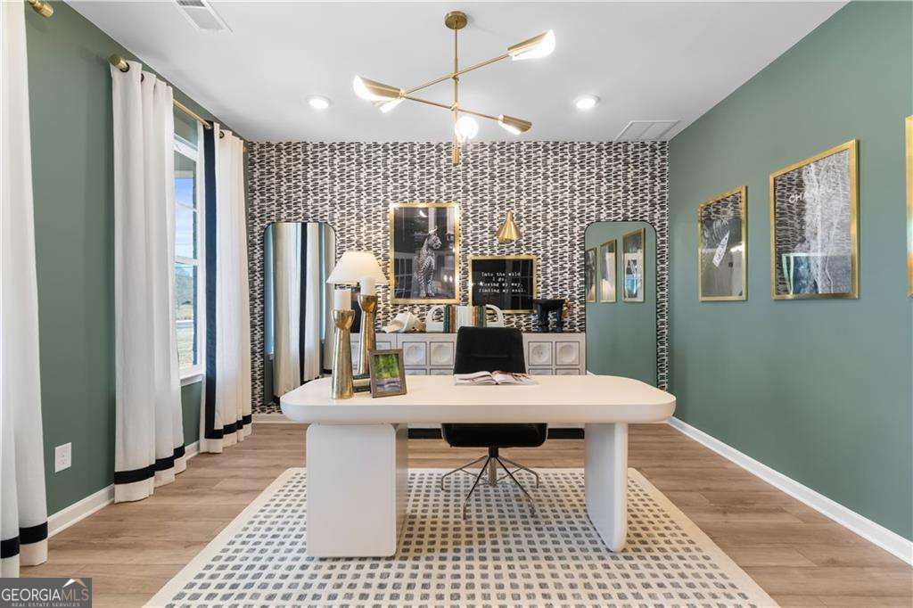 420 Hartsfield Road McDonough, GA 30253 - Photo 7 of 44 a large kitchen with a table chairs and refrigerator