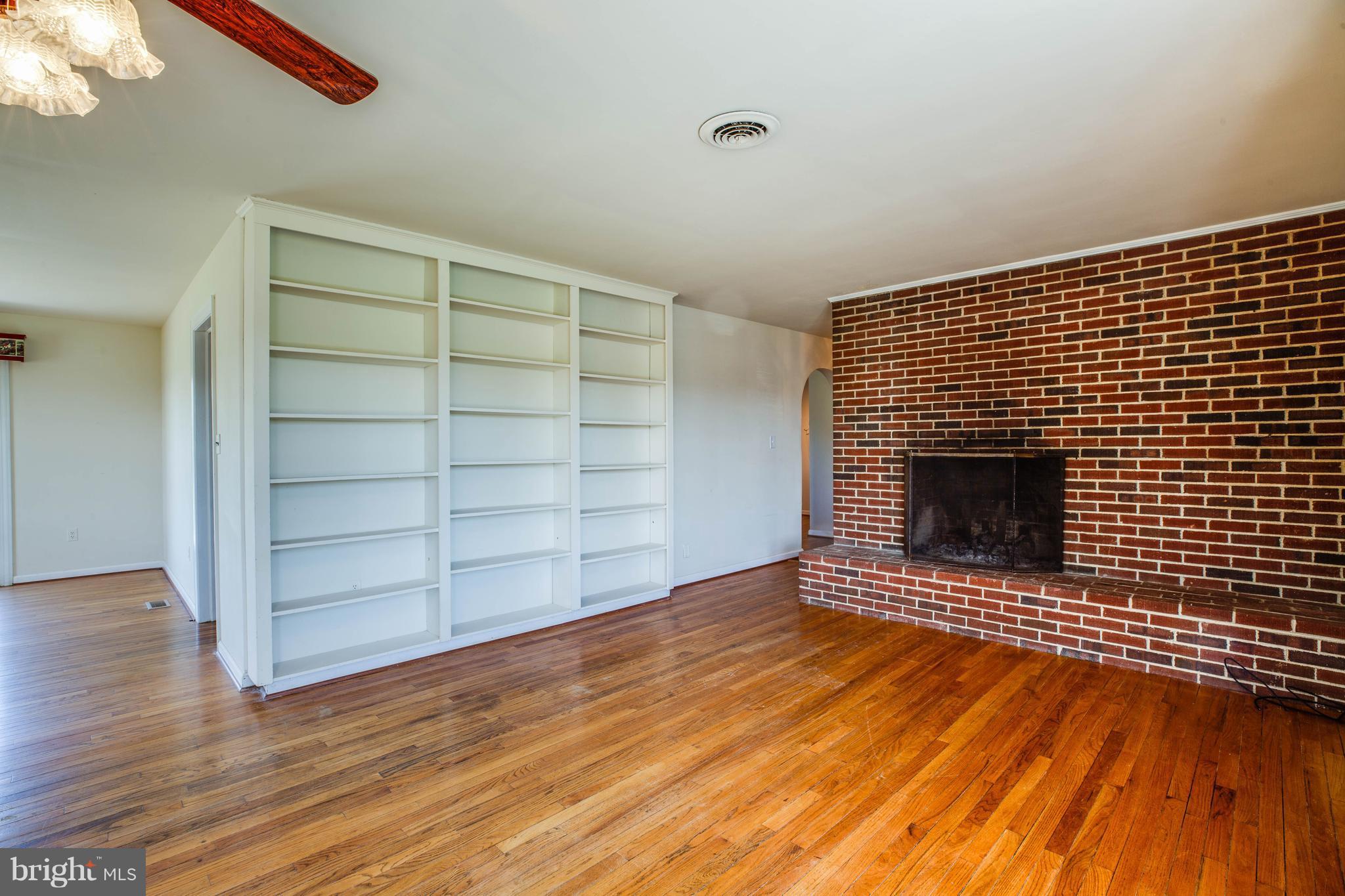 16195 Ridge Road King George, VA 22485 - Photo 12 of 29 Spacious living room with fireplace and built ins