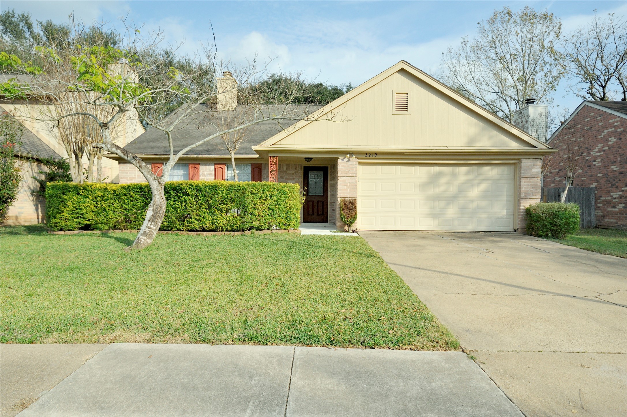 3219 Pecan Draw Court Sugar Land, TX 77479 - Photo 1 of 20 front view of a house with a yard