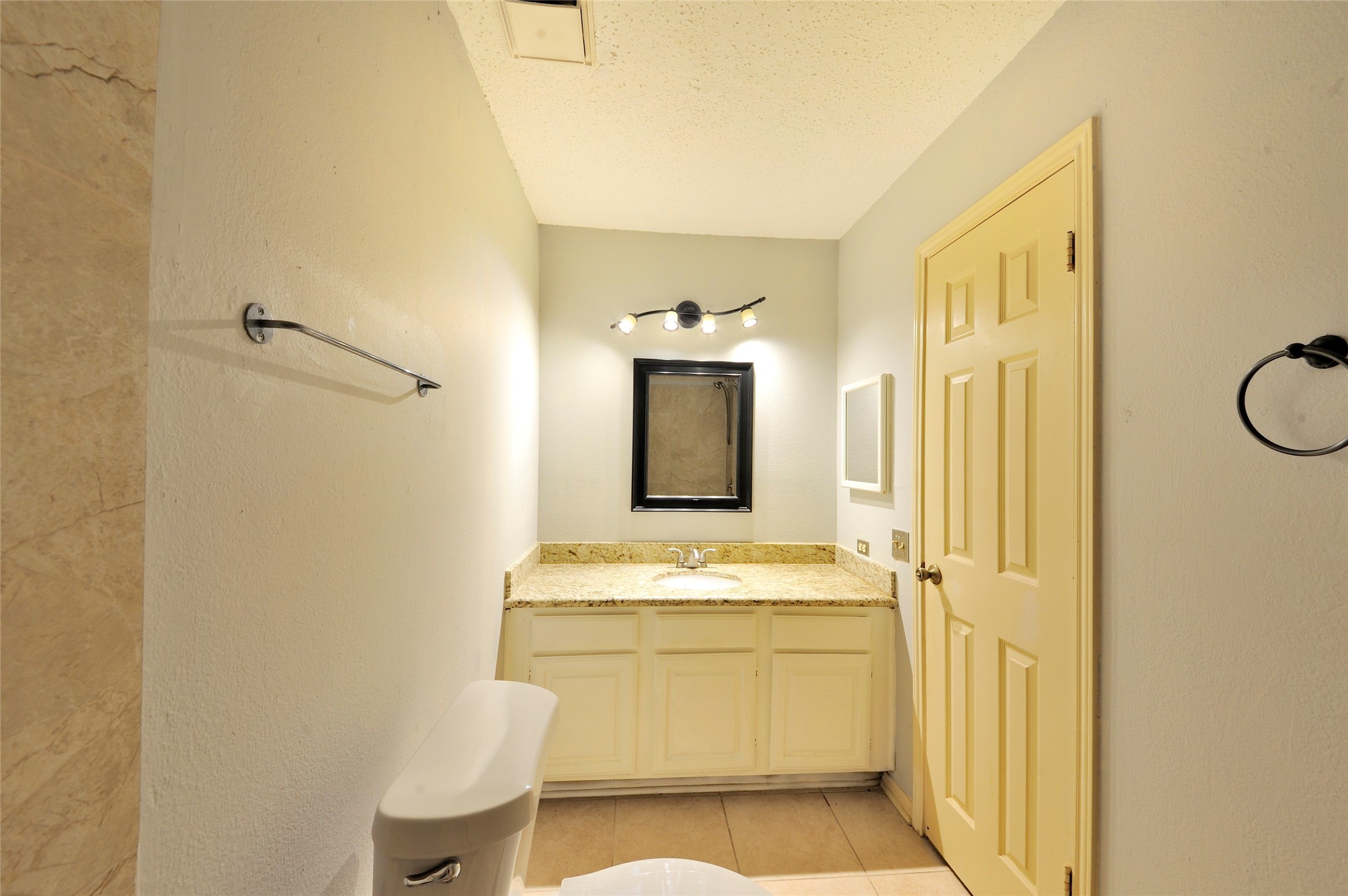3219 Pecan Draw Court Sugar Land, TX 77479 - Photo 17 of 20 a bathroom with a sink a toilet and shower