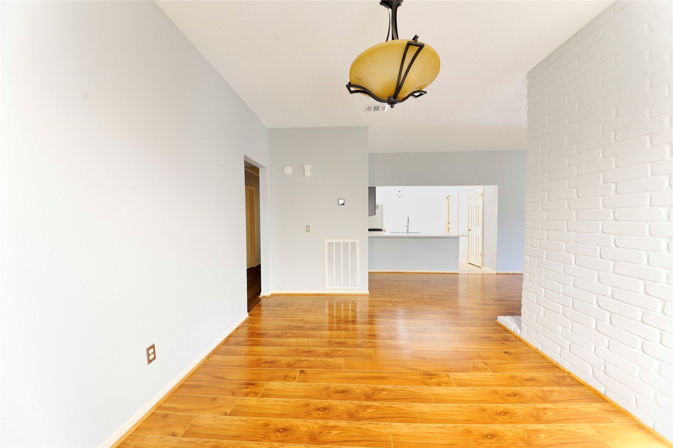 3219 Pecan Draw Court Sugar Land, TX 77479 - Photo 8 of 20 a view of empty room with wooden floor