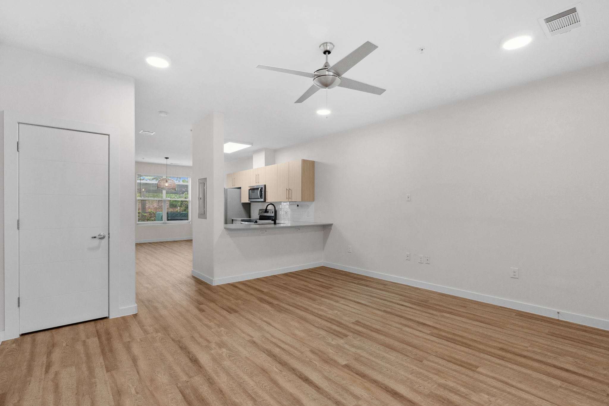 7805 Cooper Lane, Unit 606 Austin, TX 78745 - Photo 16 of 35 a view of a livingroom with a hardwood floor
