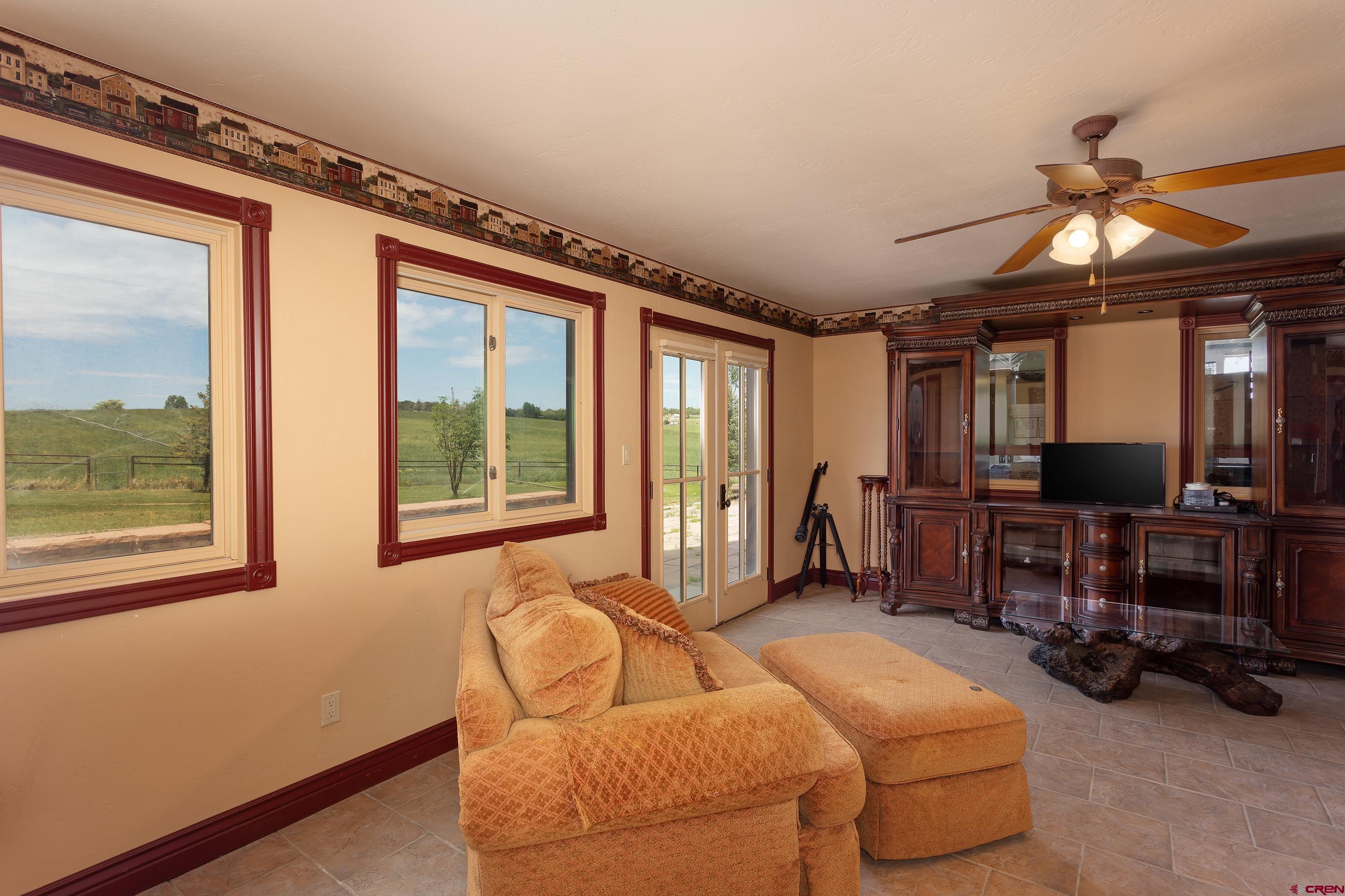 1747 County Road 514 Ignacio, CO 81137 - Photo 19 of 35 a living room with furniture and a large window