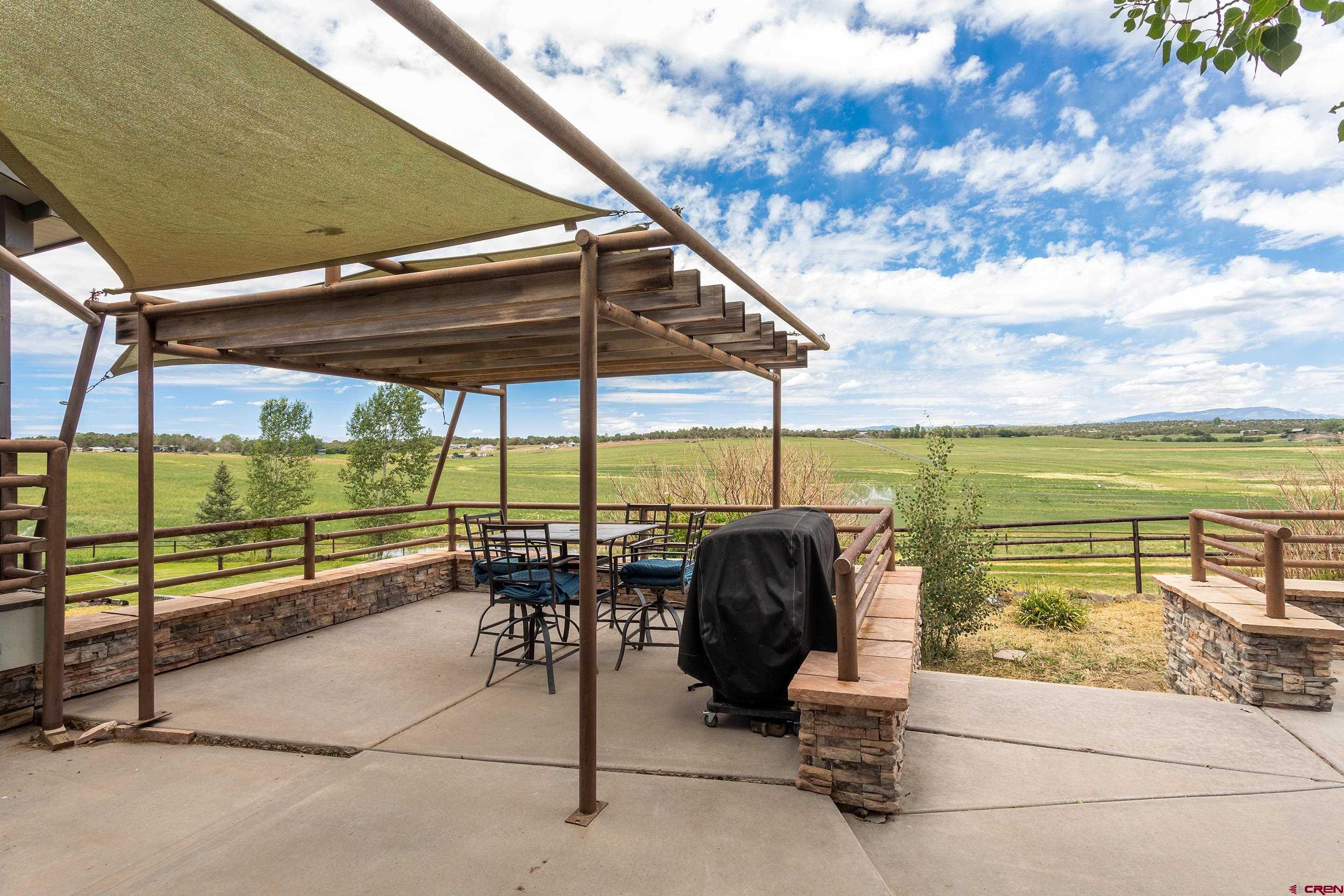 1747 County Road 514 Ignacio, CO 81137 - Photo 29 of 35 a view of chairs and table in the patio