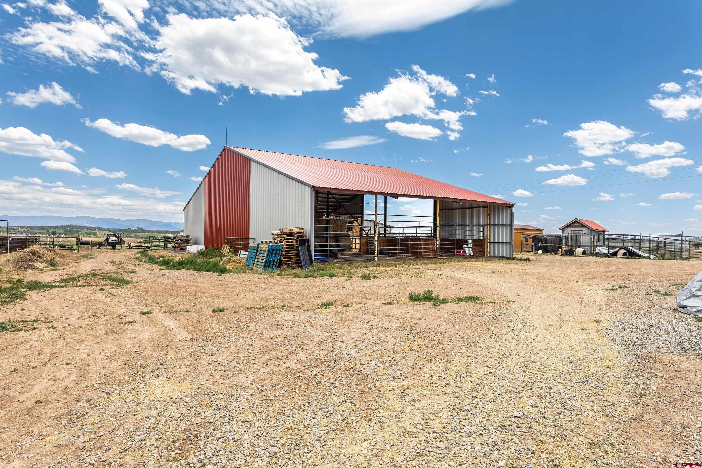 1747 County Road 514 Ignacio, CO 81137 - Photo 32 of 35 a view of a house with a yard