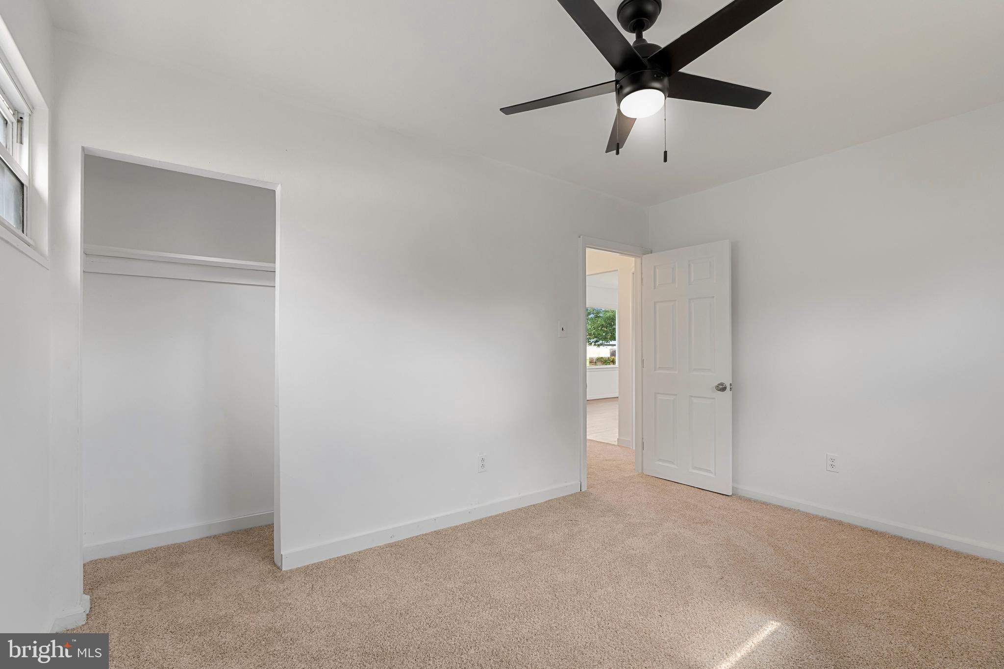 18 John Collins Circle Dover, DE 19904 - Photo 12 of 17 a view of an empty room and a ceiling fan