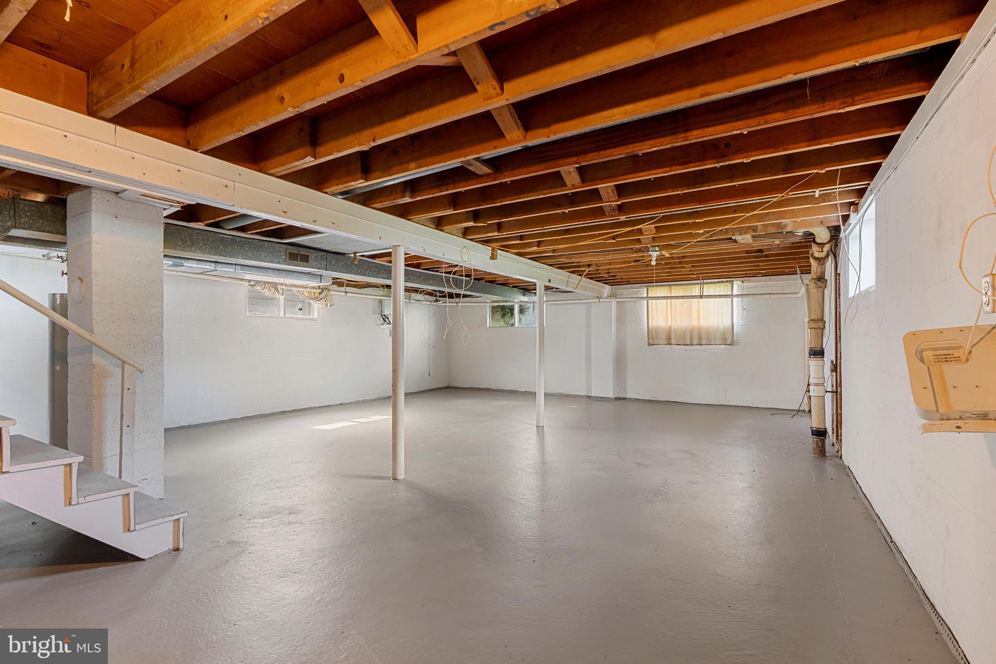 18 John Collins Circle Dover, DE 19904 - Photo 14 of 17 a view of a room with wooden floor and windows