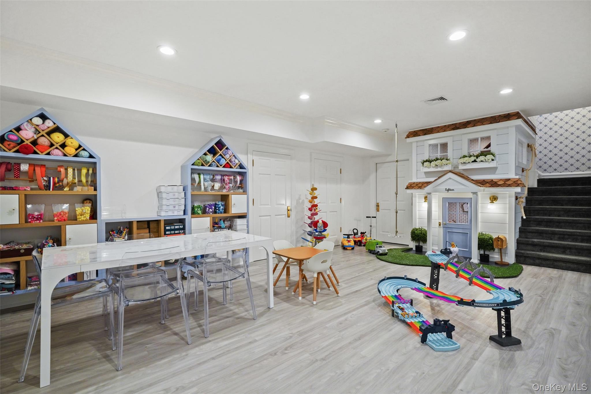 27 Murray Hill Road Scarsdale, NY 10583 - Photo 18 of 29 a living room with furniture and a wooden floor