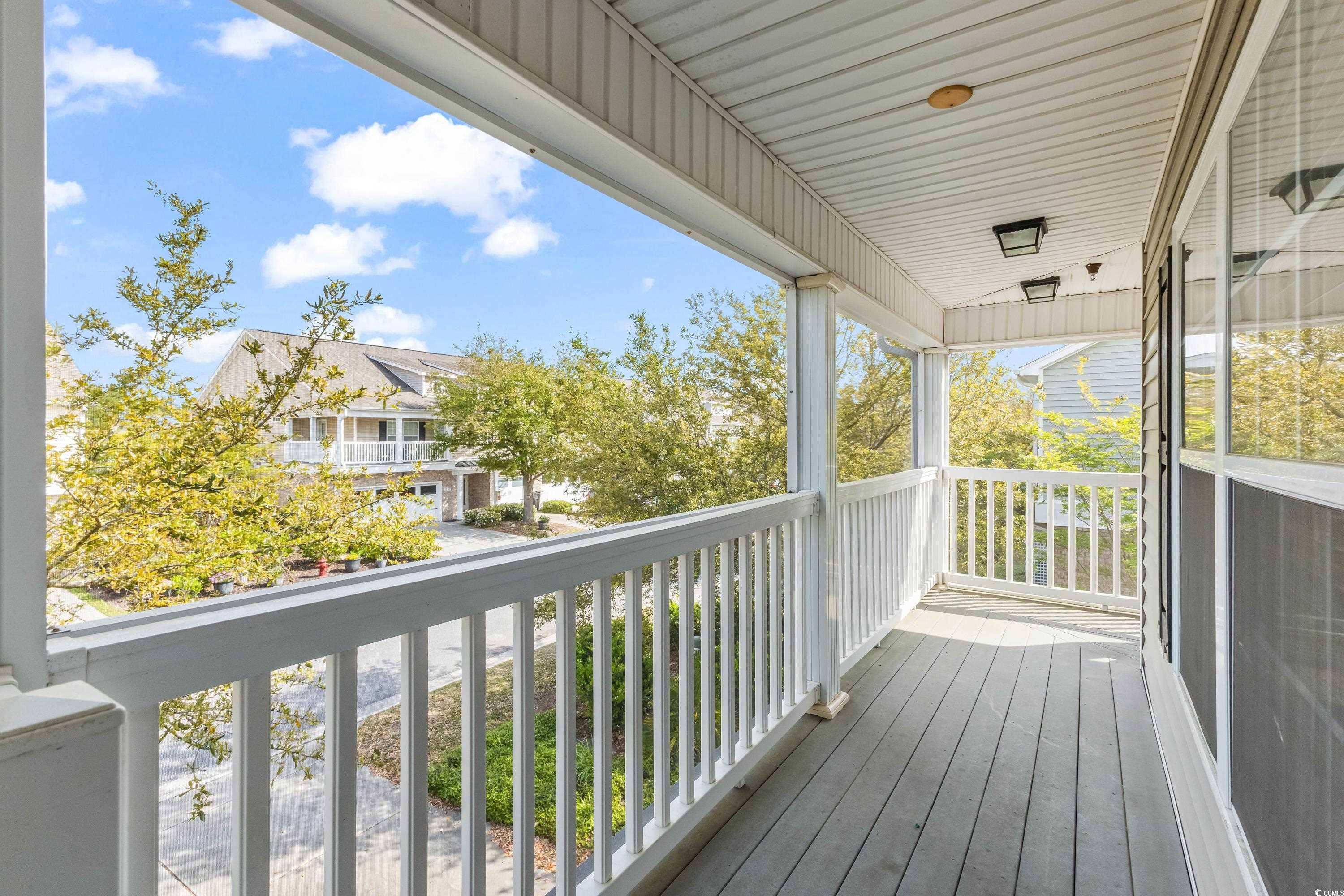 400 Black Smith Lane, Unit A Myrtle Beach, SC 29579 - Photo 17 of 35 Balcony featuring a sunroom