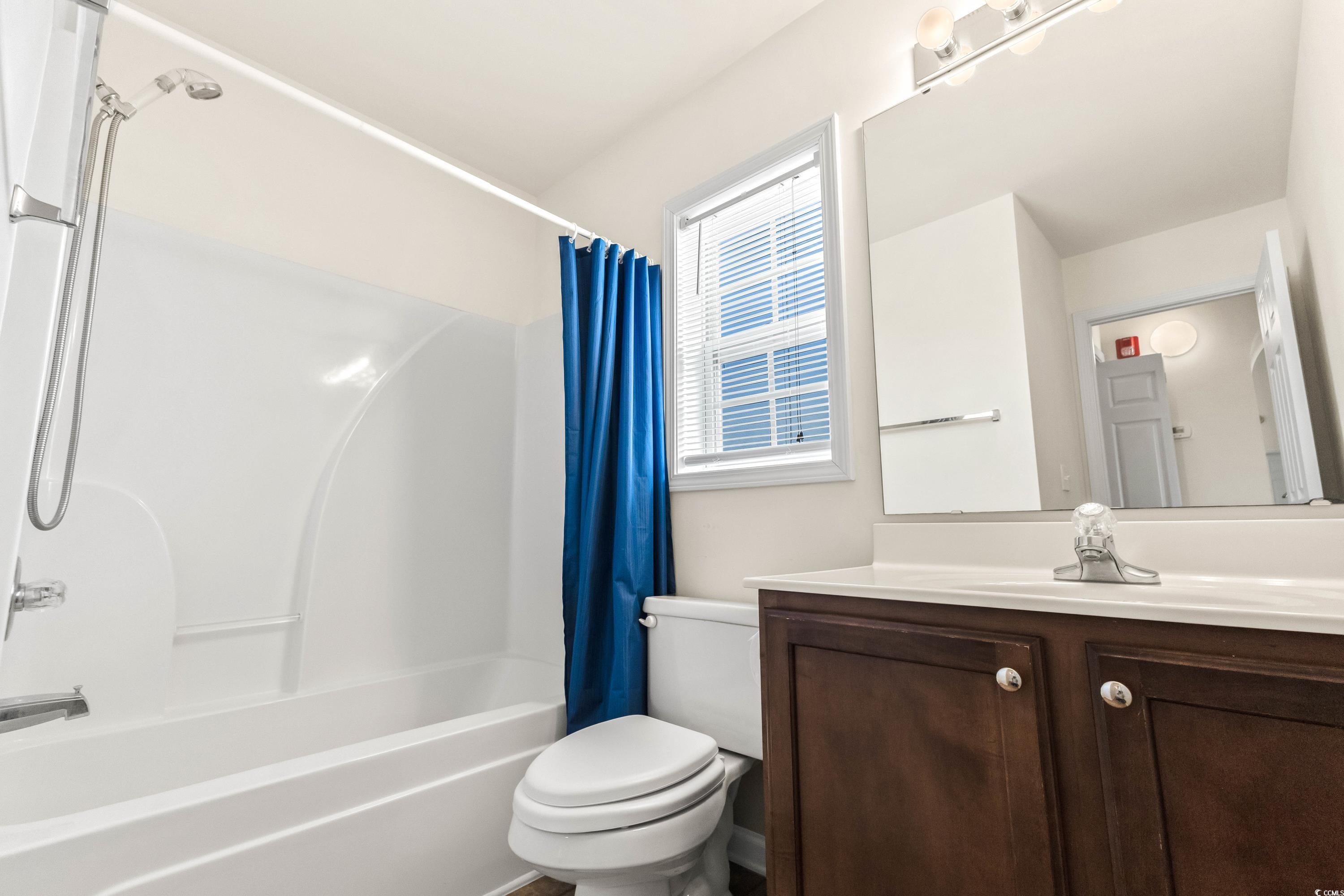 400 Black Smith Lane, Unit A Myrtle Beach, SC 29579 - Photo 29 of 35 Bathroom with shower / tub combo and vanity