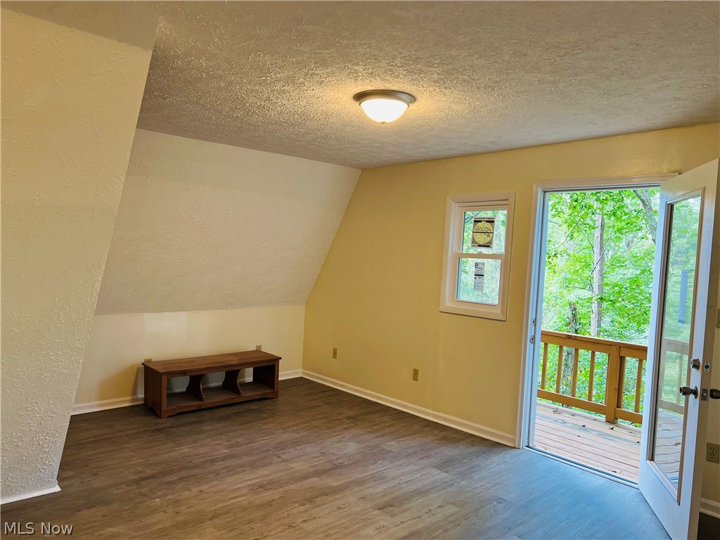 75305 Lake Ridge Road Piedmont, OH 43983 - Photo 9 of 25 Living room space with outdoor deck accessibility