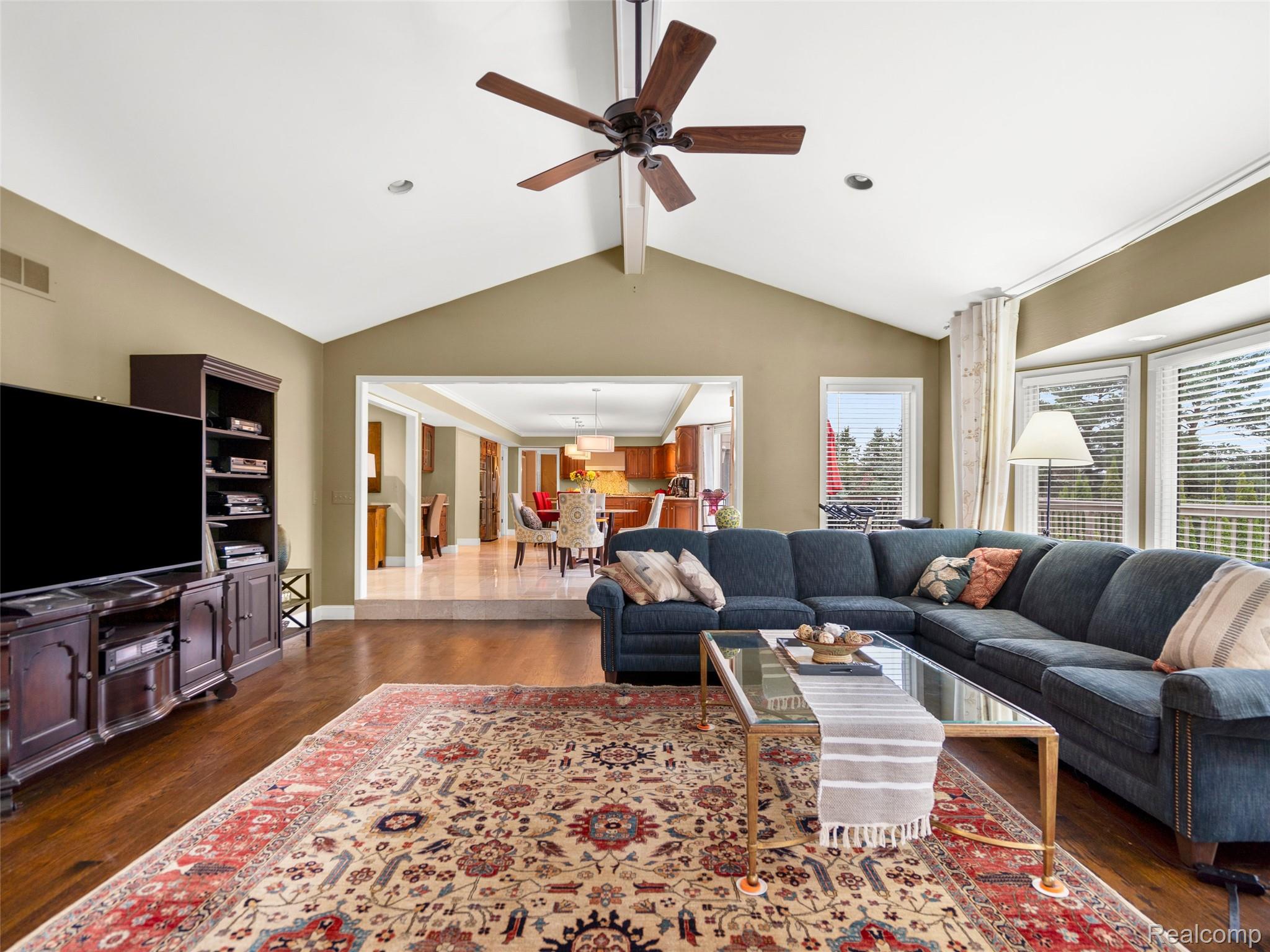 5724 Murfield Drive Rochester, MI 48306 - Photo 60 of 99 Living room featuring dark wood finished floors and ceiling fan