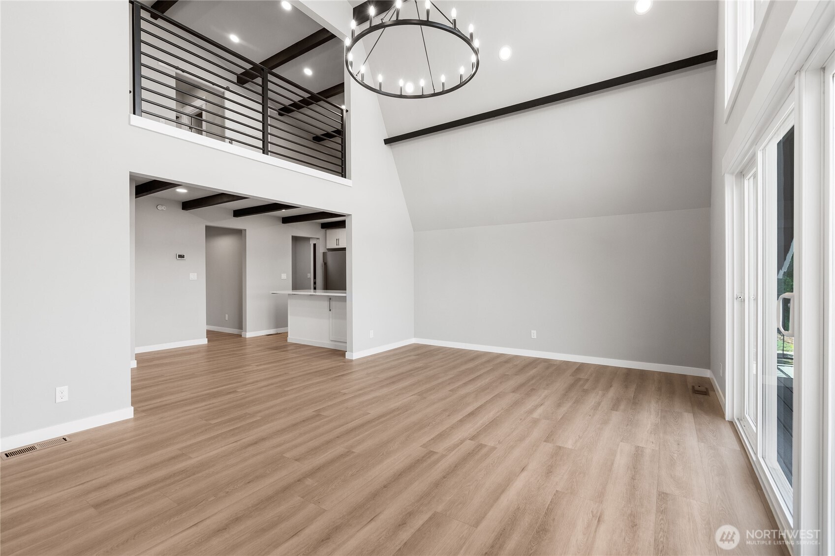 10005 North Davies Road Lake Stevens, WA 98258 - Photo 17 of 40 a view of a livingroom with wooden floor