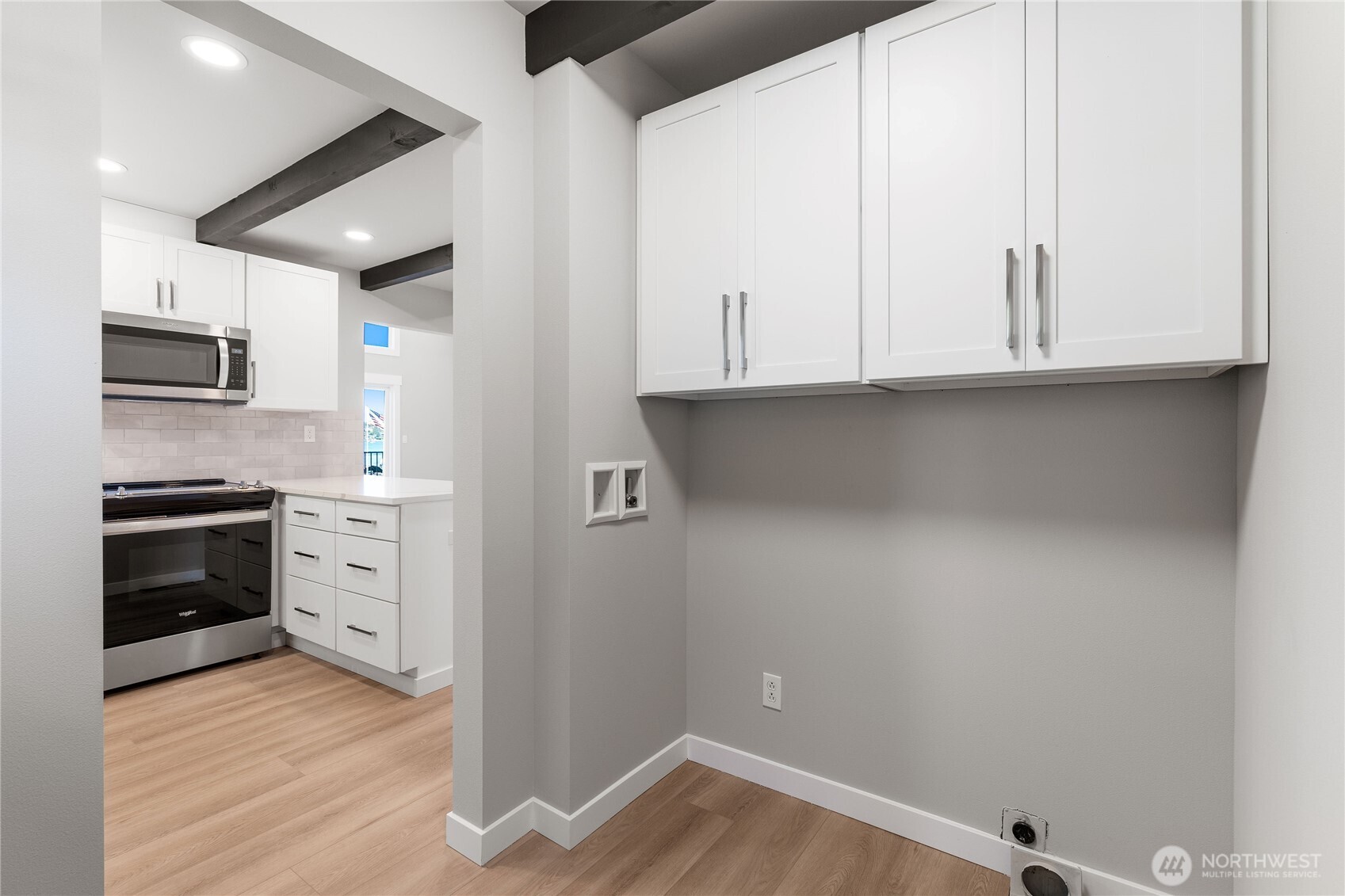 10005 North Davies Road Lake Stevens, WA 98258 - Photo 18 of 40 a view of cabinets and wooden floor