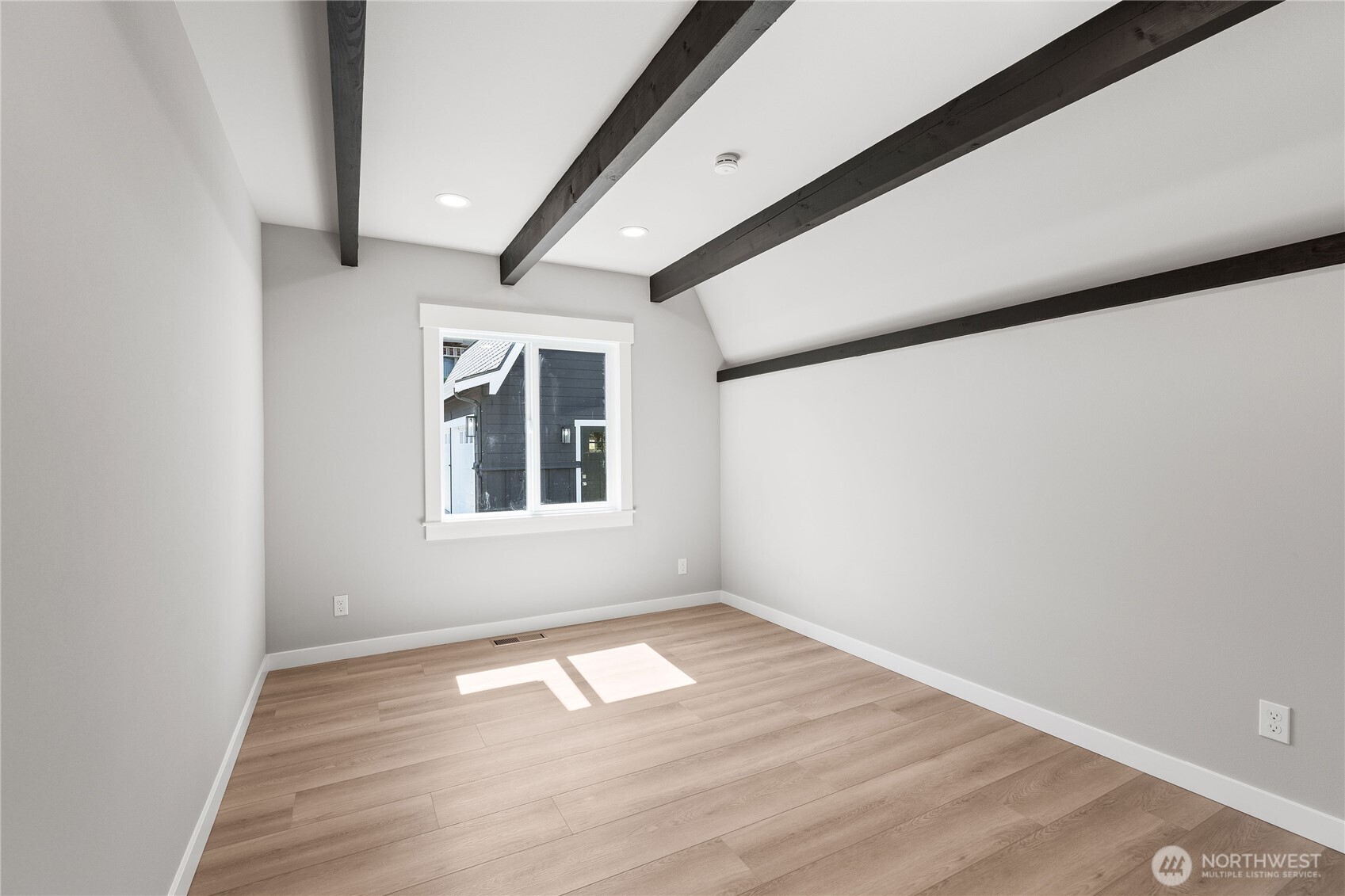 10005 North Davies Road Lake Stevens, WA 98258 - Photo 19 of 40 a view of empty room with wooden floor and fan