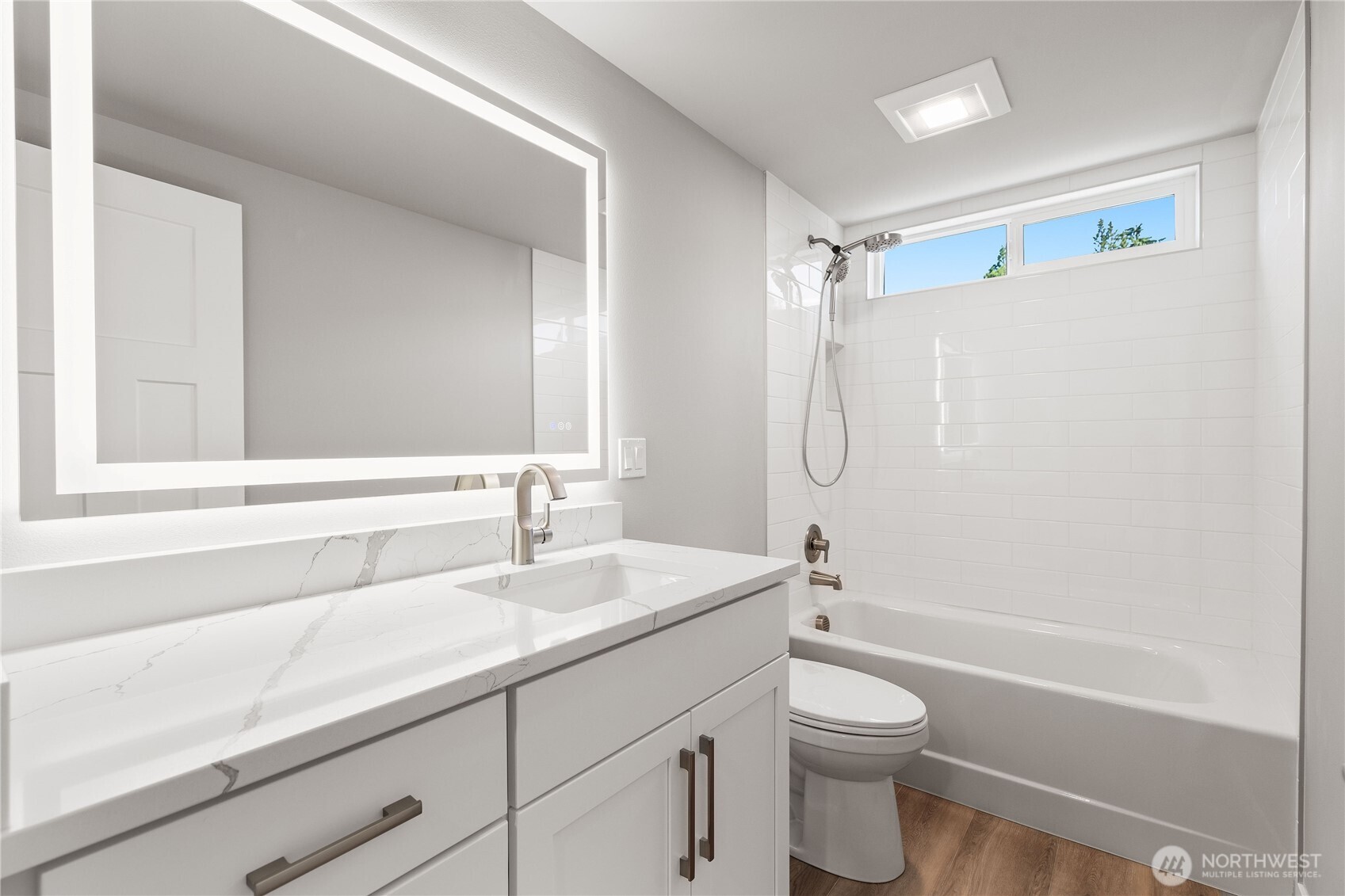 10005 North Davies Road Lake Stevens, WA 98258 - Photo 21 of 40 a bathroom with a granite countertop sink a toilet and shower