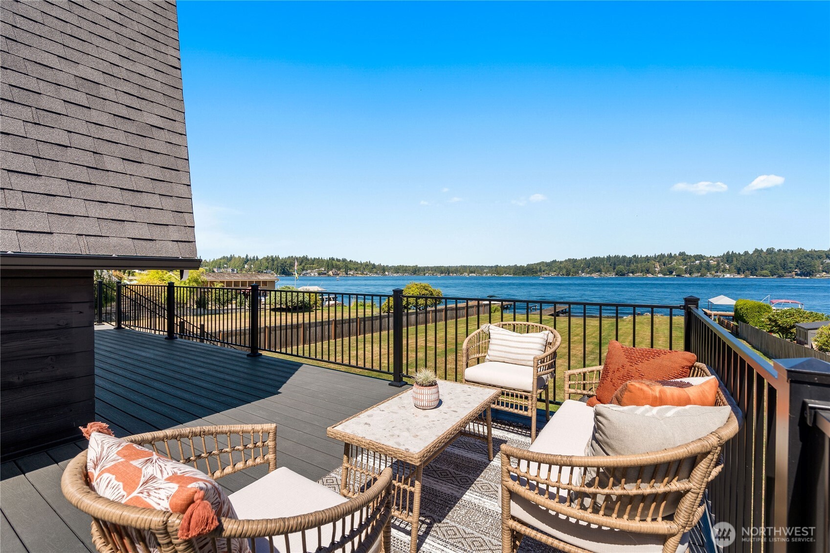10005 North Davies Road Lake Stevens, WA 98258 - Photo 36 of 40 a view of a balcony with lake view and wooden floor