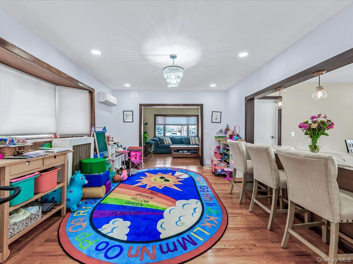 219-08 38th Avenue Queens, NY 11361 - Photo 2 of 24 a room with furniture and window