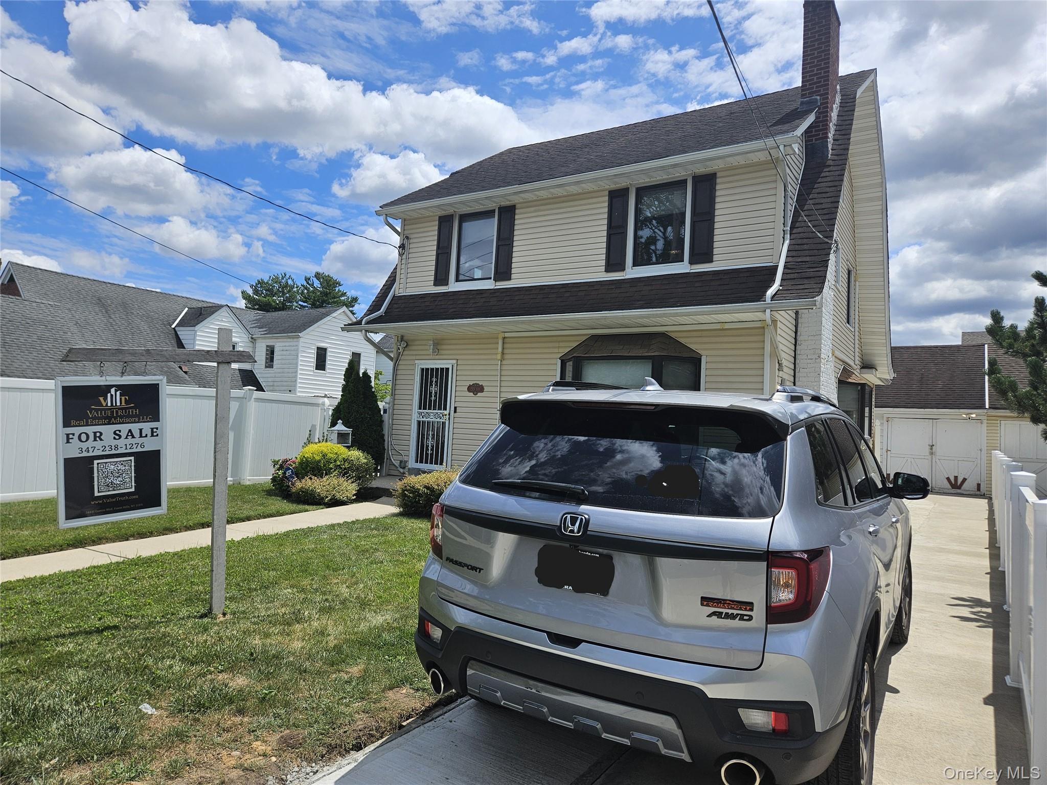 219-08 38th Avenue Queens, NY 11361 - Photo 24 of 24 a house view with a garden space