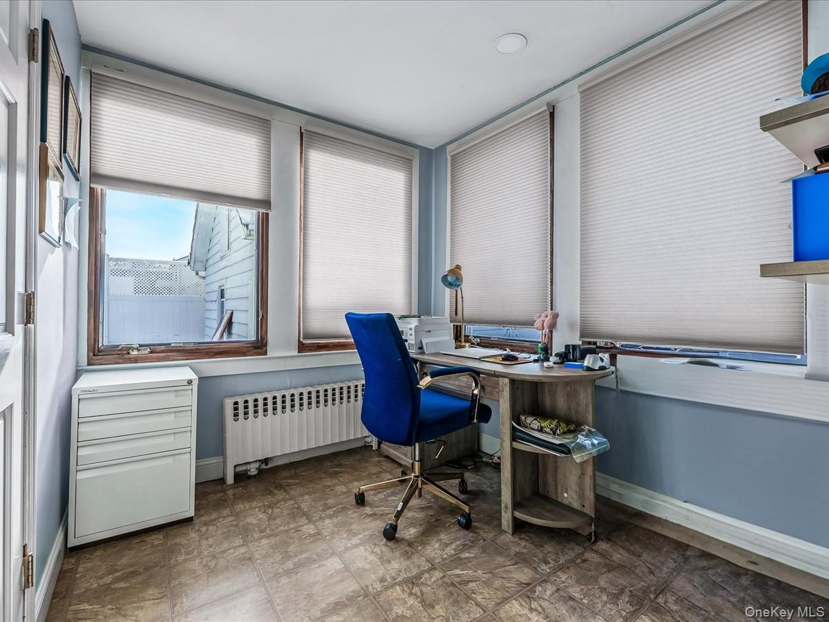 219-08 38th Avenue Queens, NY 11361 - Photo 7 of 24 a room with furniture