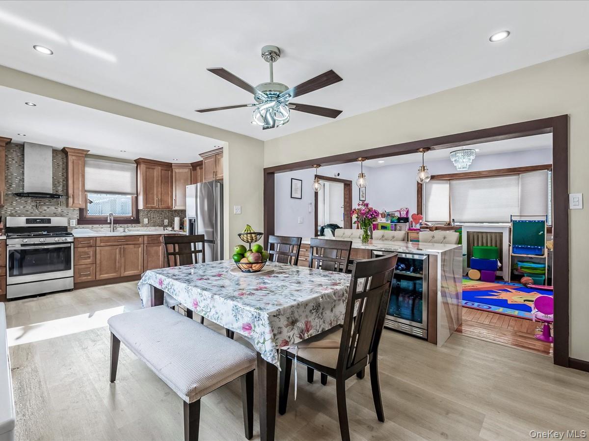 219-08 38th Avenue Queens, NY 11361 - Photo 8 of 24 a view of a dining room with furniture and a kitchen