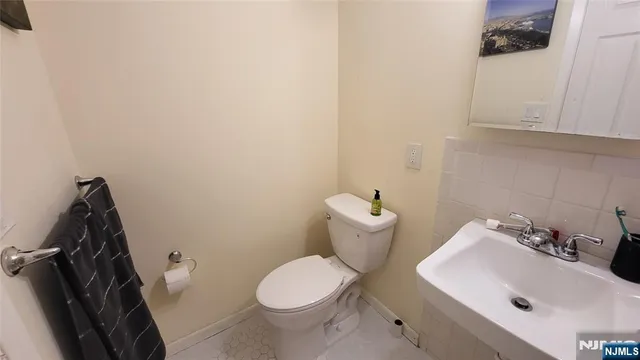 a bathroom with a sink and a toilet