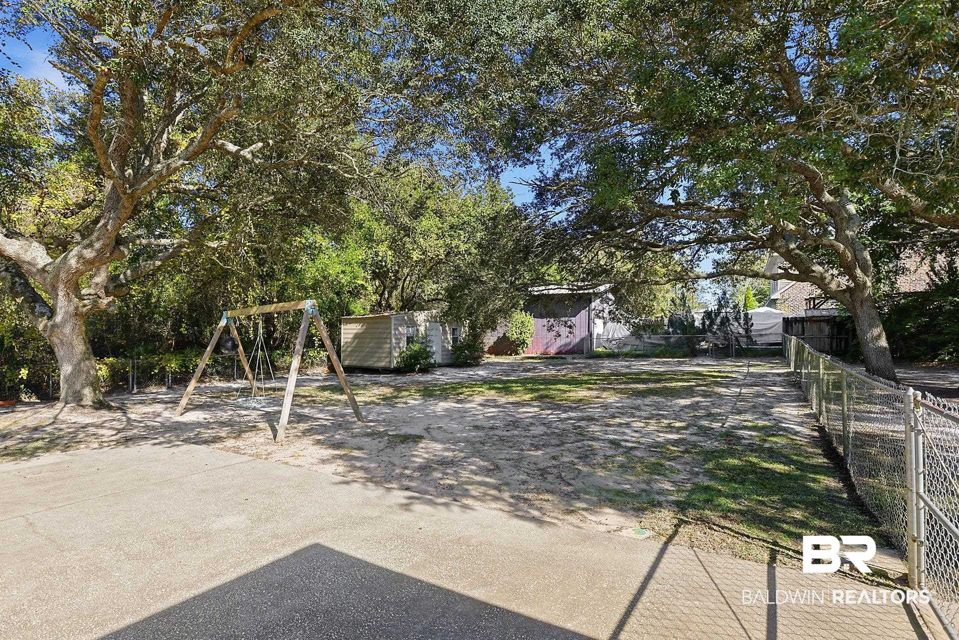 25793 Bonito Avenue Orange Beach, AL 36561 - Photo 7 of 27 View of fenced backyard