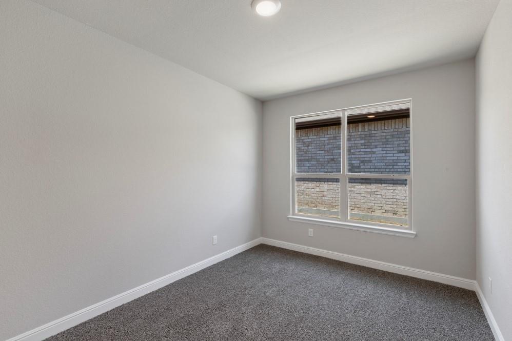 130 Lunayena Road Rhome, TX 76078 - Photo 24 of 39 an empty room with a window